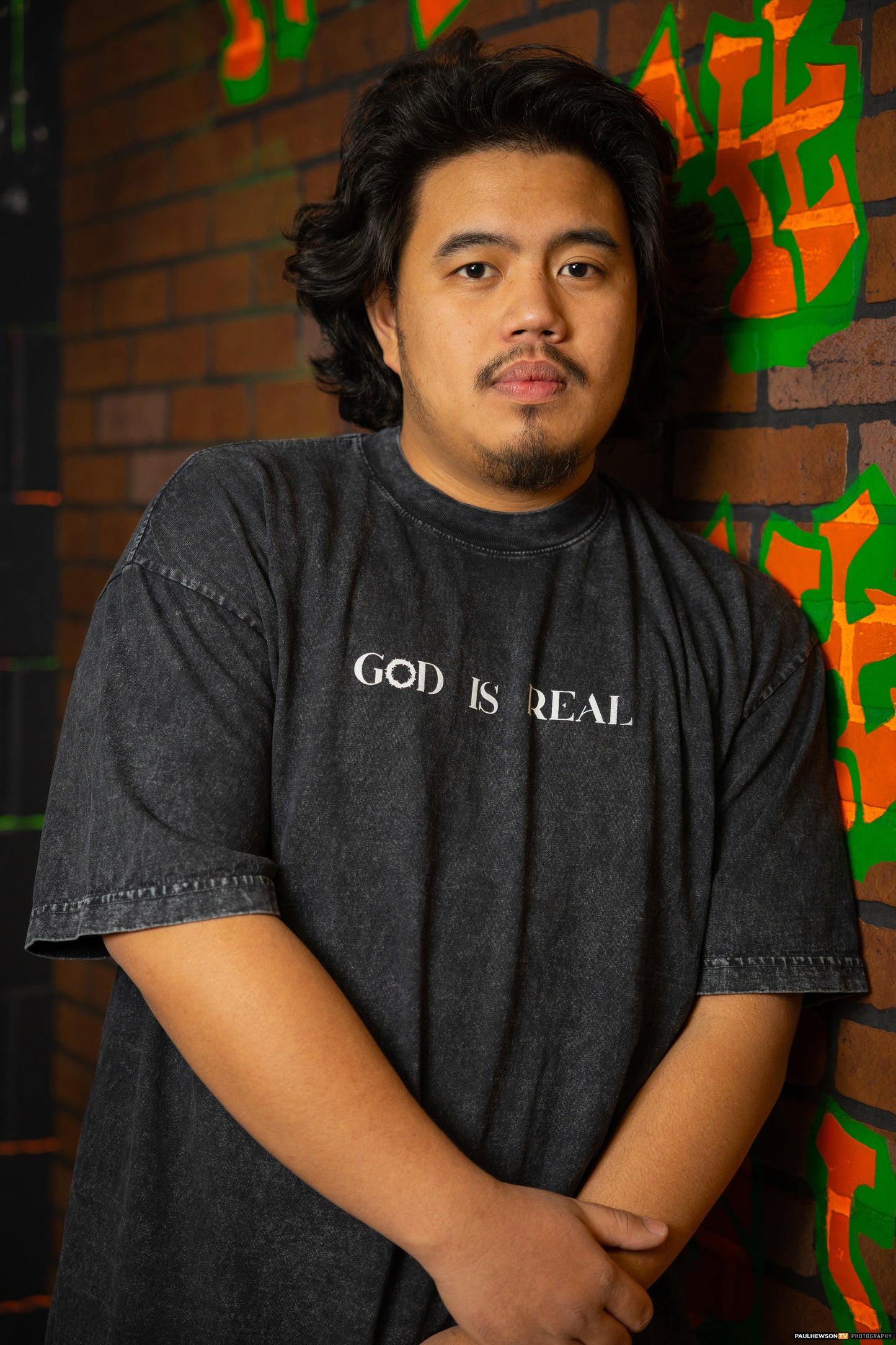 God is Real Mineral Washed Black Tee