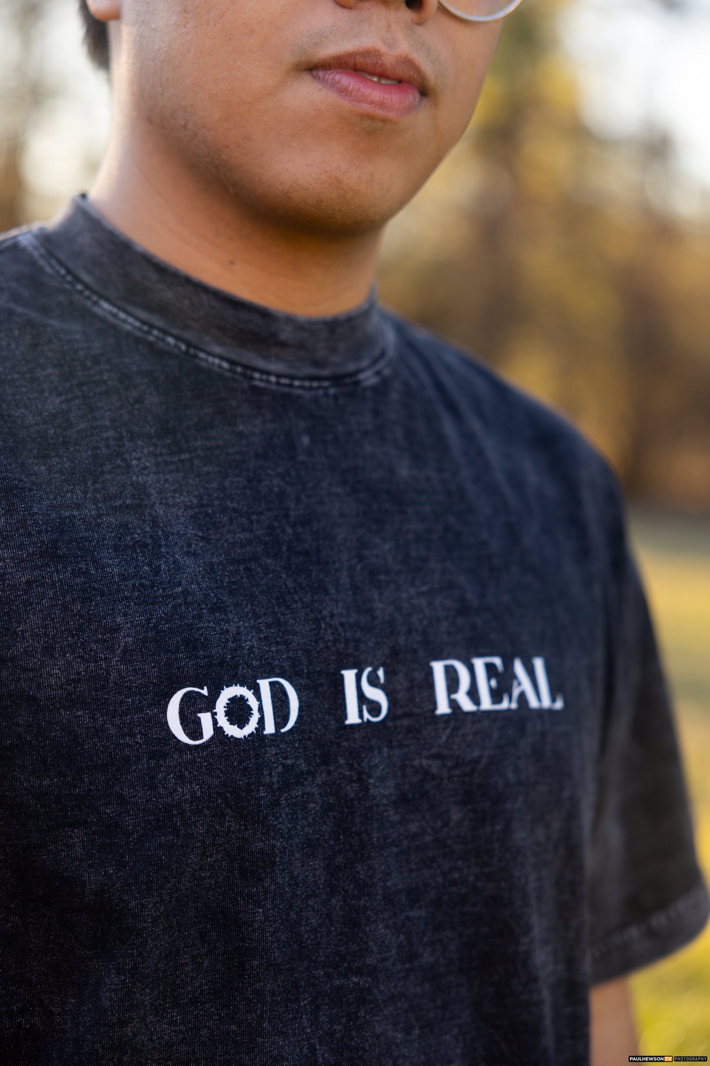 God is Real Mineral Washed Black Tee